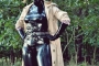 walking-by-the-shadow-of-forest-in-full-rubber-enclosure-rubberhell-31