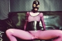 pink-latex-catsuit-covered-in-fishnet-06