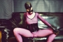 pink-latex-catsuit-covered-in-fishnet-07