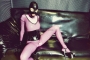 pink-latex-catsuit-covered-in-fishnet-09