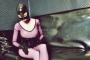 pink-latex-catsuit-covered-in-fishnet-11