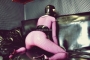 pink-latex-catsuit-covered-in-fishnet-20
