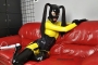 yellow-black-latex-doll-on-leather-sofa-4-21