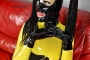 yellow-black-latex-doll-on-leather-sofa-4-26