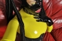 yellow-black-latex-doll-on-leather-sofa-4-32