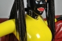 yellow-black-latex-doll-on-leather-sofa-4-36